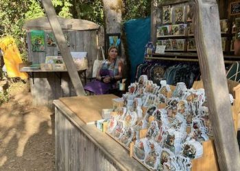 Stickers at the Oregon Country Fair 2026 Poster Artist Booth